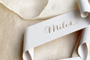 calligraphy on a scroll wedding place setting