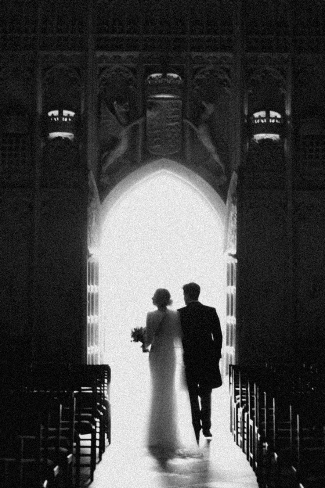 Artful Cambridge archway wedding photograph in black and white by Damien Vickers Photography