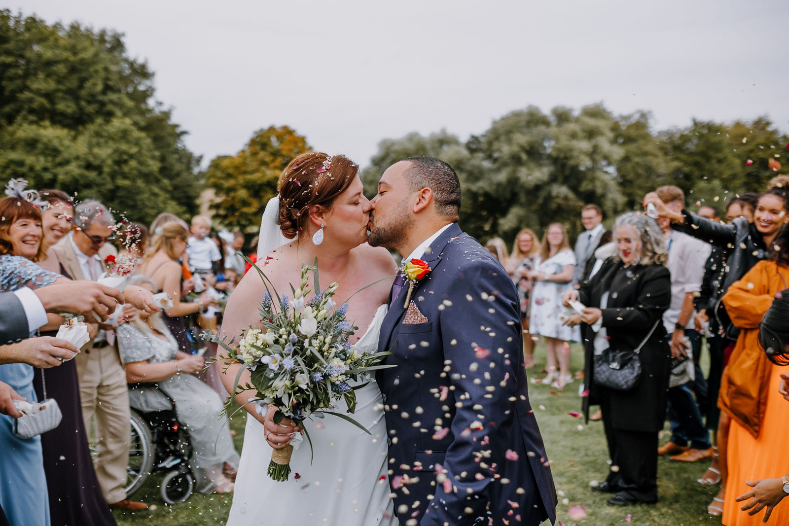 Newlyweds photograph with dried petal confetti UK | The Dried Petal Company and Constance Doyle Photographer