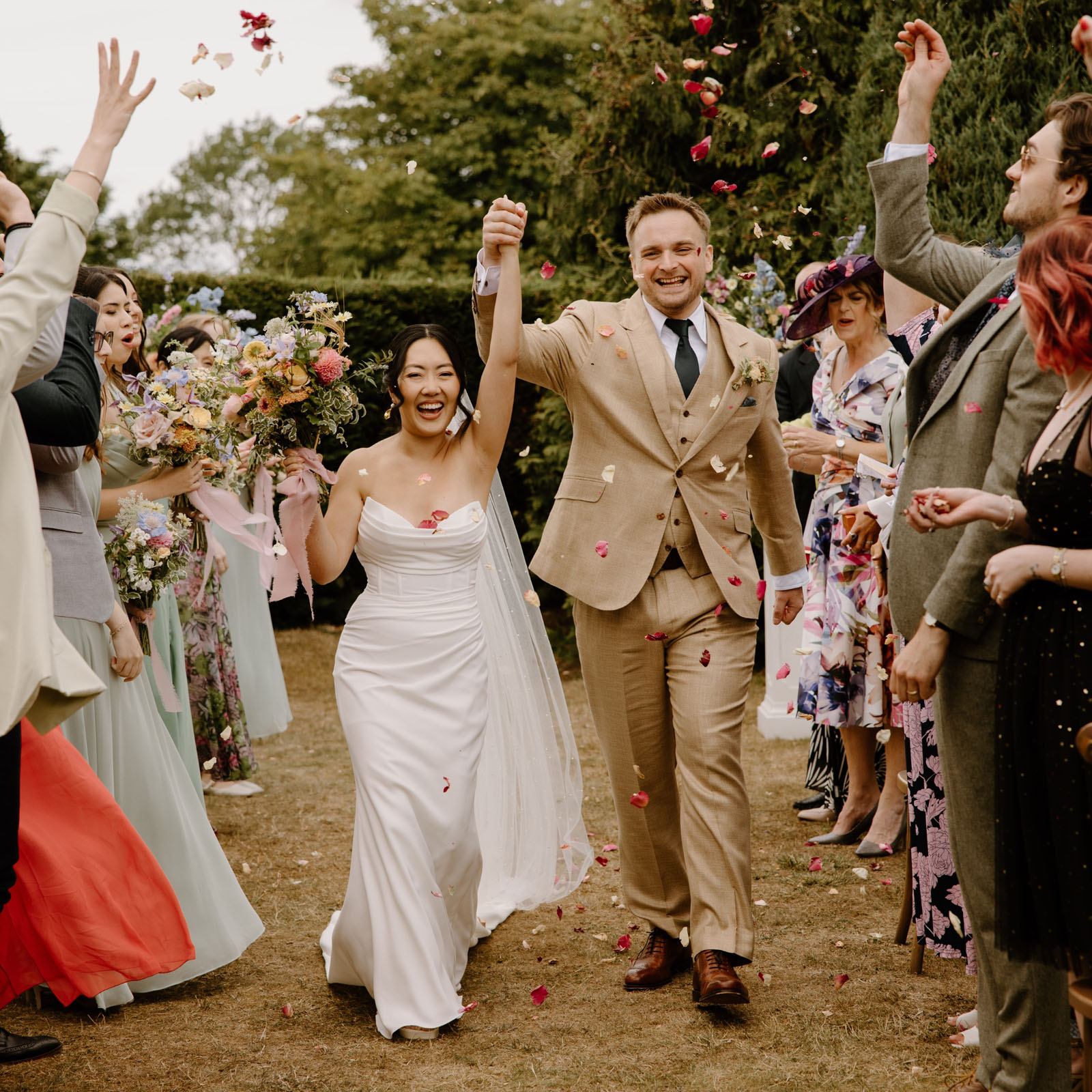 Confetti moment with real petal confetti - image by Soul Capture Photography dried petal confetti UK | The Dried Petal Company