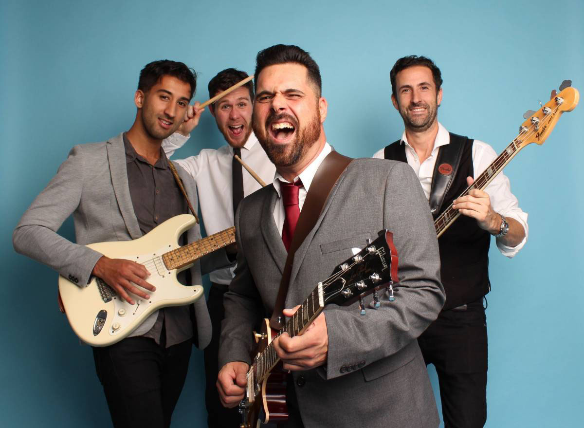 rock and roll wedding musicians singing and playing guitar | Last Minute Musicians wedding entertainment agency UK wide