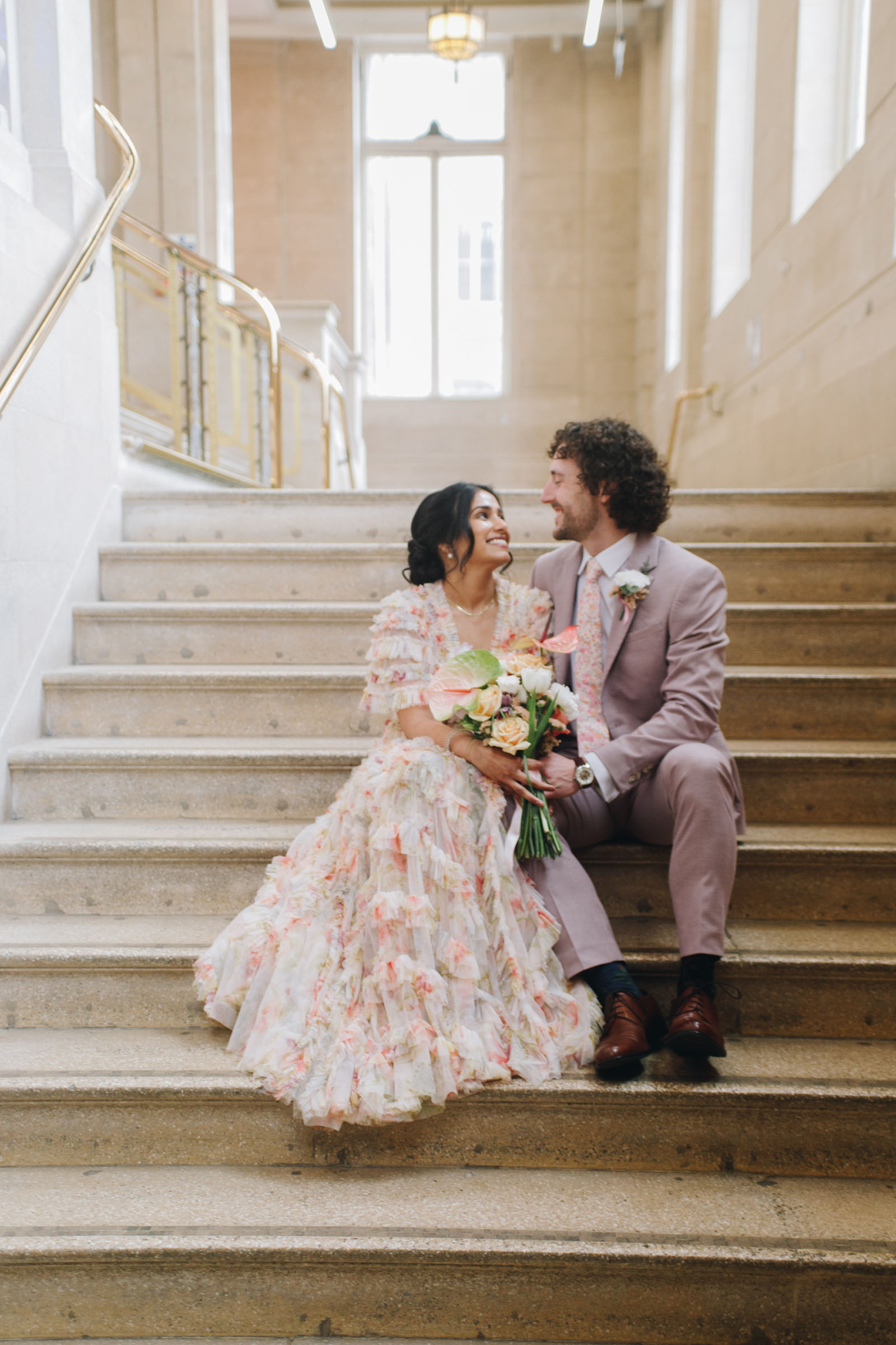 Newlyweds at Bolton Albert Halls by Priti Shikotra Photography on English Wedding Blog