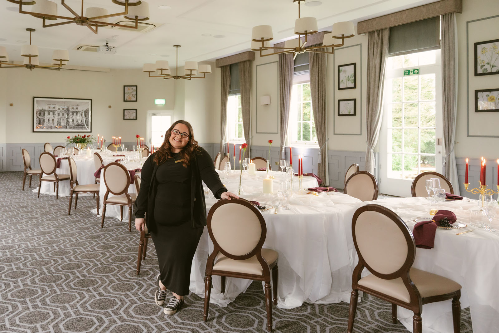 Berkshire wedding planner Lauren Batten Events in a wedding venue dressed for a reception