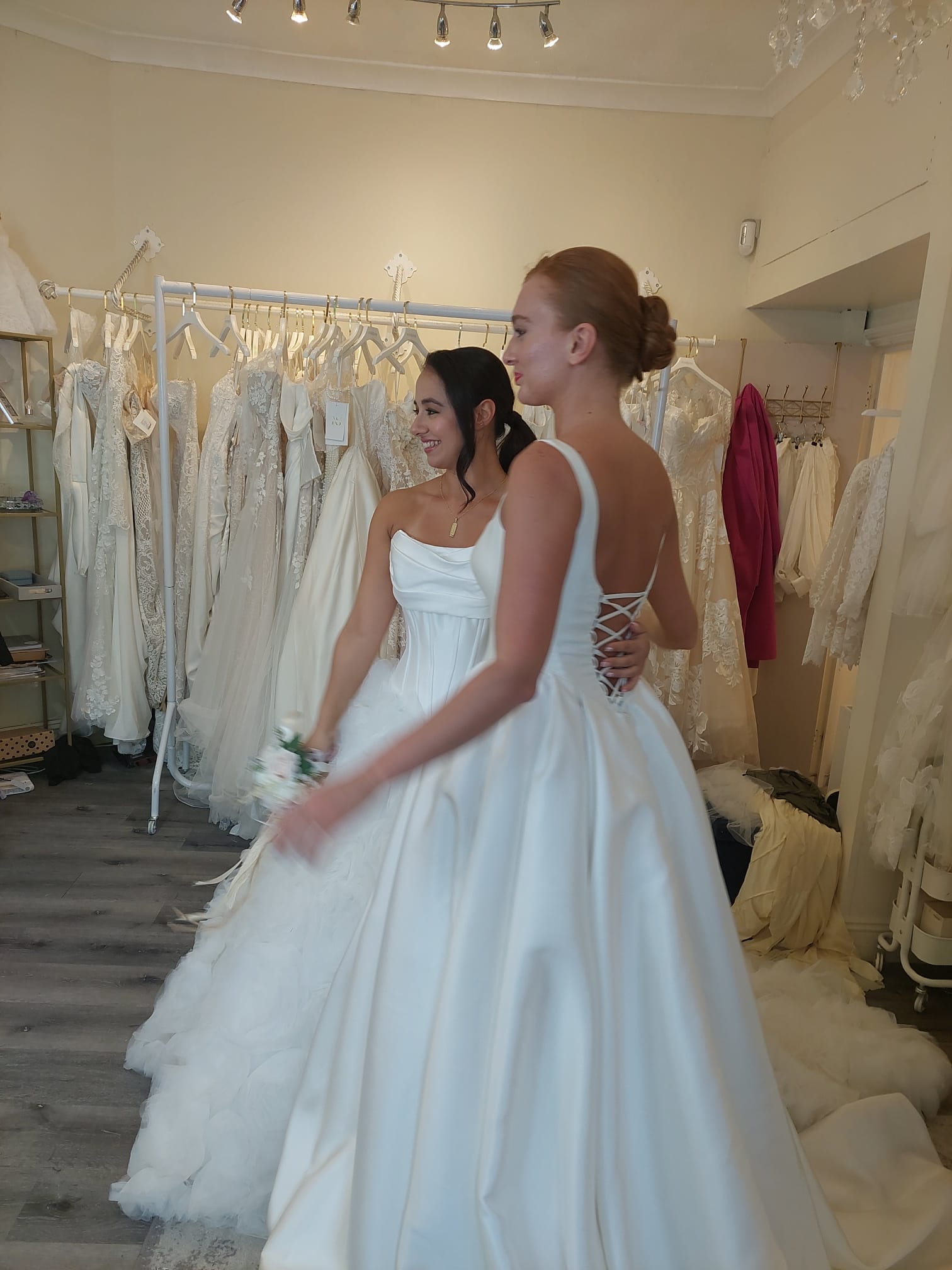 Models dressed in wedding gowns by London UK bridal dresser Silver Silver