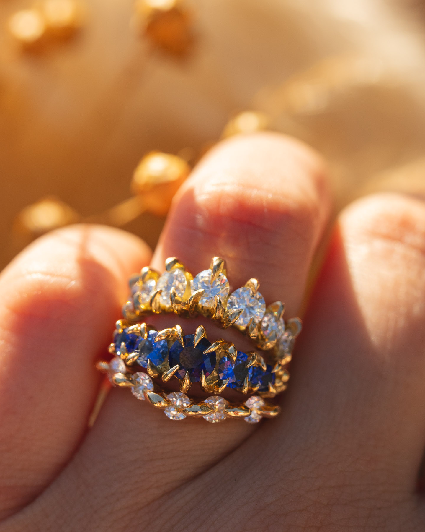 Blue and white sapphire and diamond engagement ring stacks by Philippa Davin Jewelry