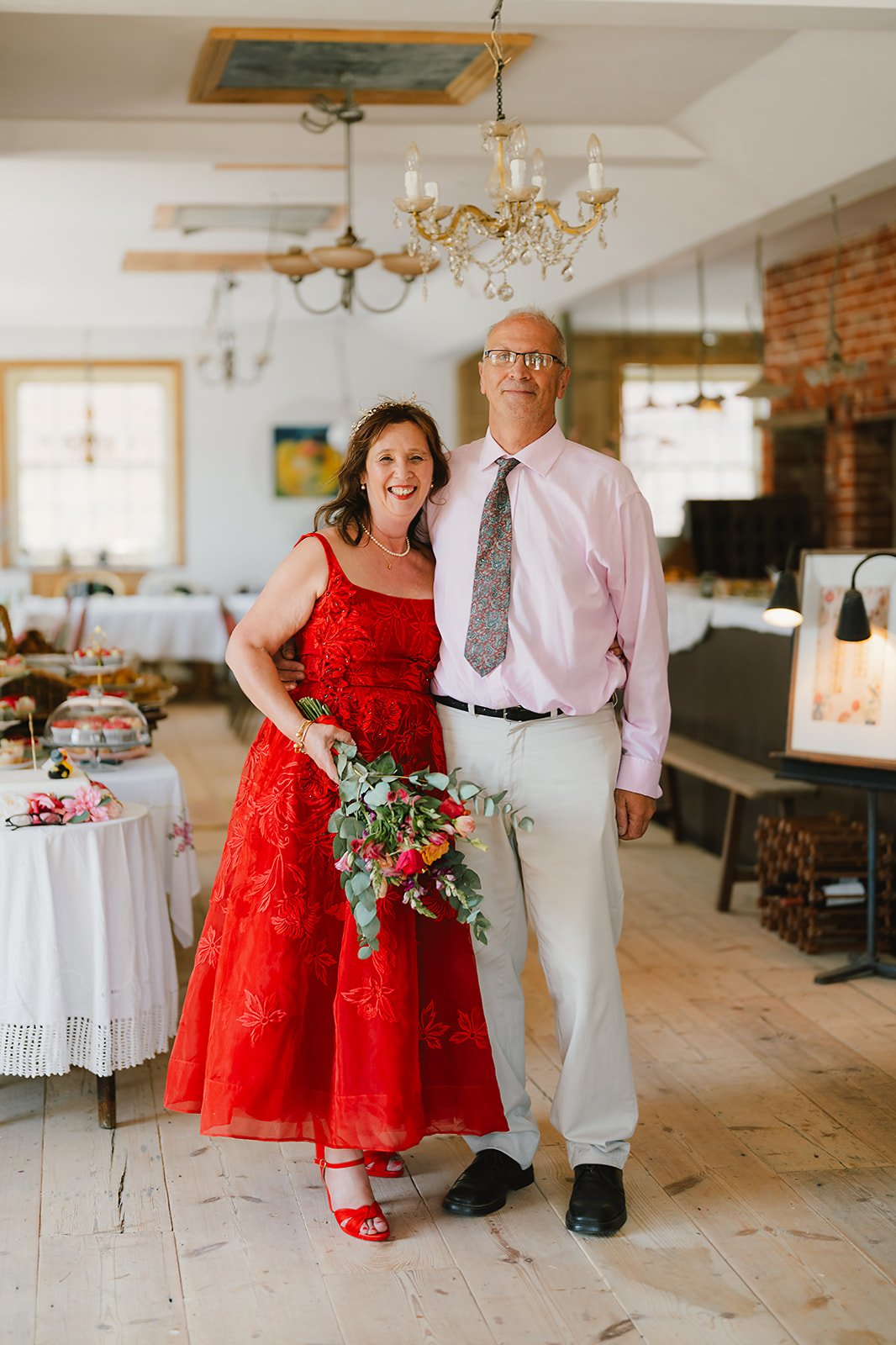 A beautiful red dress for Boo & Simon’s break-all-the-rules, joy-filled wedding, with Andy Davison Photography